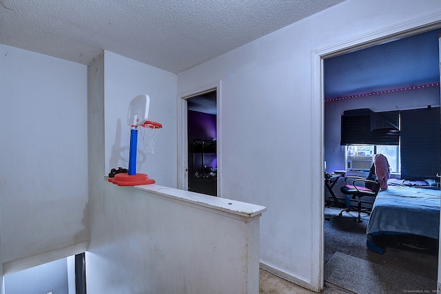 interior space featuring a textured ceiling