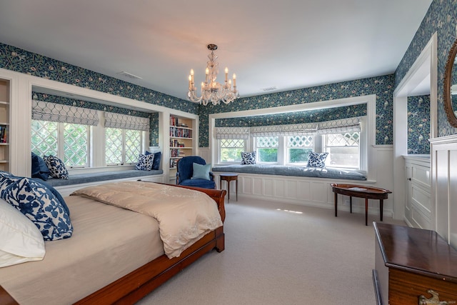 51 Ferry Bridge Rd, Washington, CT 06793 - carpeted bedroom featuring wallpapered walls, a wainscoted wall, and a chandelier