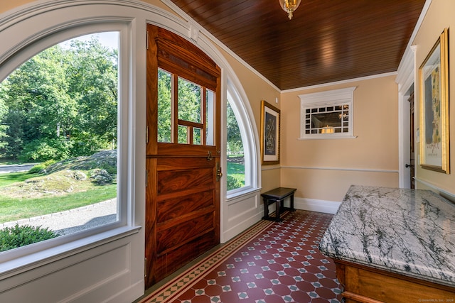 foyer entrance featuring crown molding and wooden ceiling