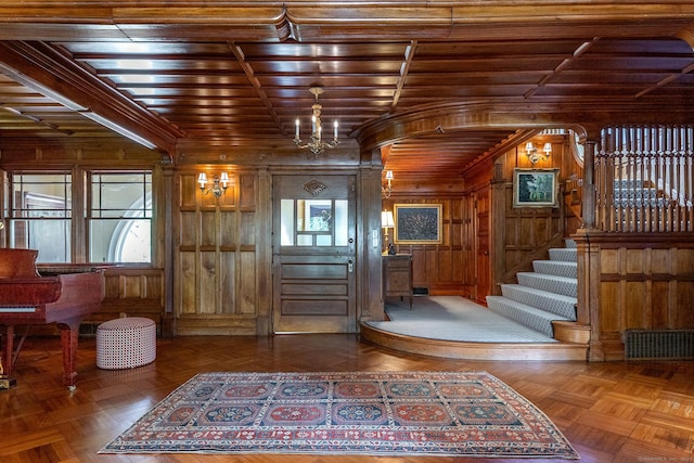 51 Ferry Bridge Rd, Washington, CT 06793 - entrance foyer featuring wooden walls, wooden ceiling, plenty of natural light, stairs, and ornamental molding