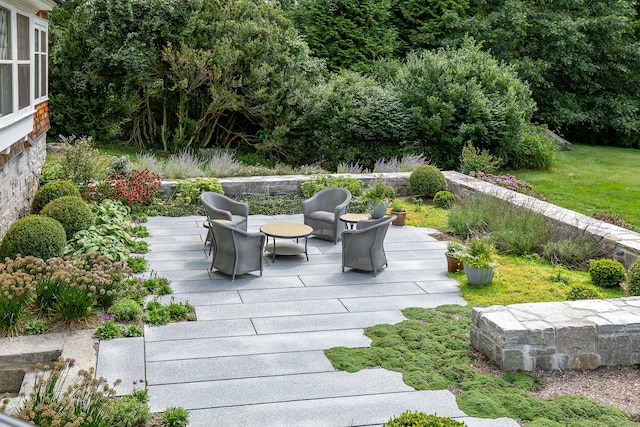 wooden deck featuring a patio area