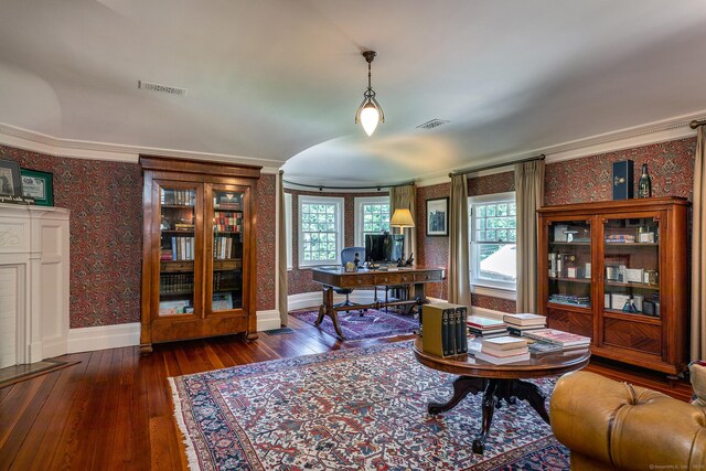 living room featuring ornamental molding and dark hardwood / wood-style flooring