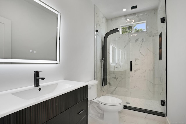 full bath featuring a marble finish shower, toilet, marble finish floor, vanity, and recessed lighting