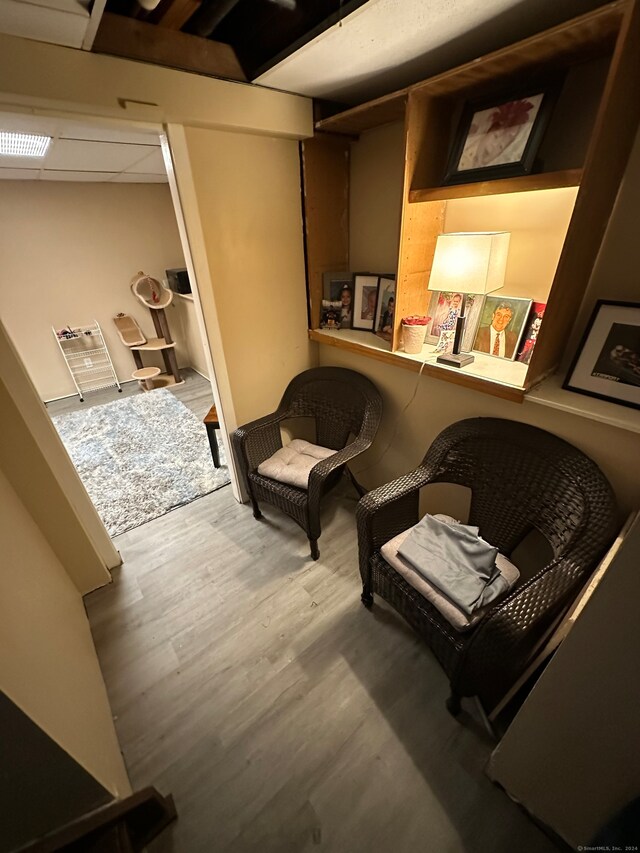 sitting room featuring hardwood / wood-style floors