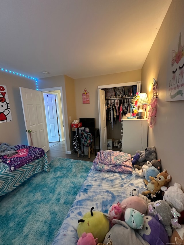 bedroom featuring a closet and carpet floors