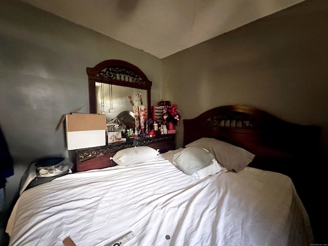 bedroom with vaulted ceiling