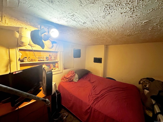 bedroom with a textured ceiling