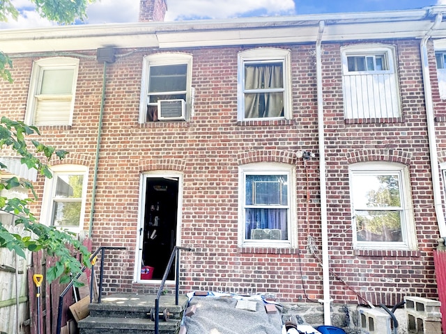 view of property with cooling unit