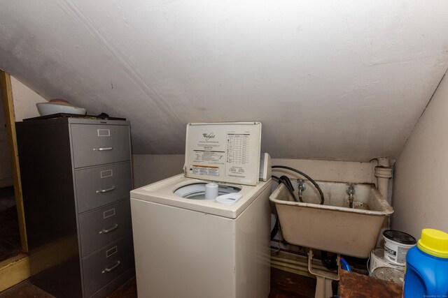 laundry area with sink and washer / dryer