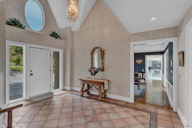 138 River Rd, Deep River, CT 06417 - entrance foyer with inlaid floor details, baseboards, a chandelier, light tile patterned floors, and recessed lighting