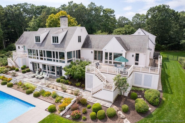 138 River Rd, Deep River, CT 06417 - rear view of property with stairs, a chimney, a patio, a deck, and an outdoor pool