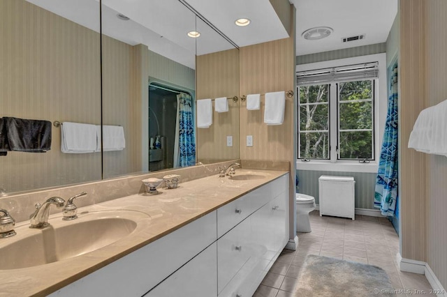 138 River Rd, Deep River, CT 06417 - bathroom with toilet, tile patterned floors, baseboards, double vanity, and a shower with shower curtain