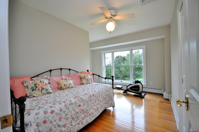 bedroom featuring ceiling fan and wood finished floors