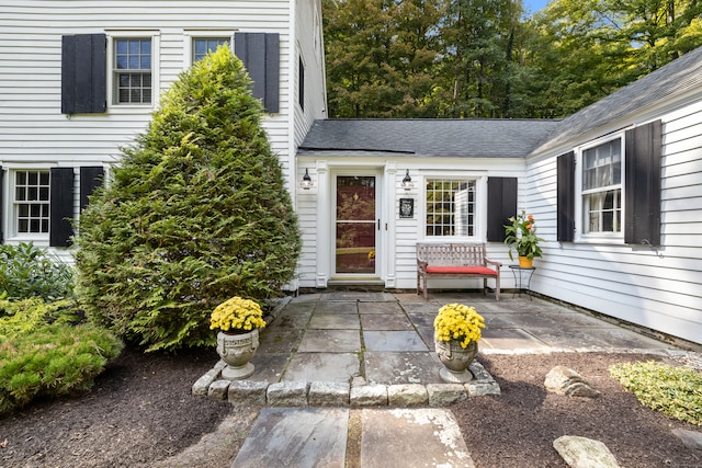 doorway to property featuring a patio area