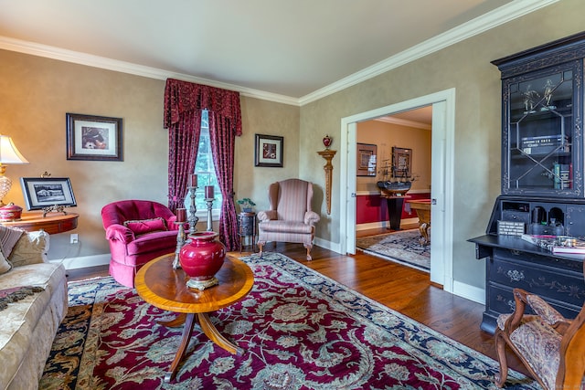 living room with crown molding and dark hardwood / wood-style flooring