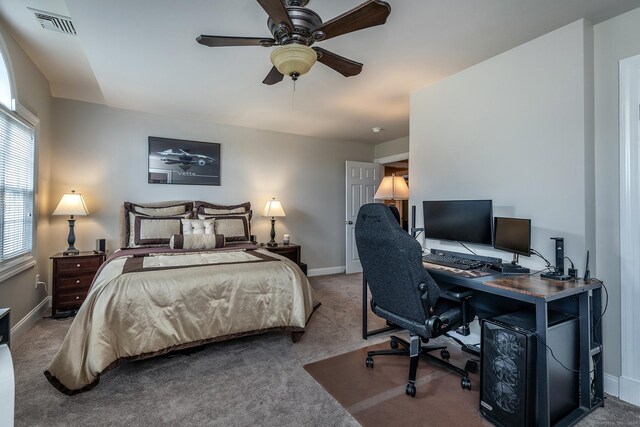 carpeted bedroom with ceiling fan