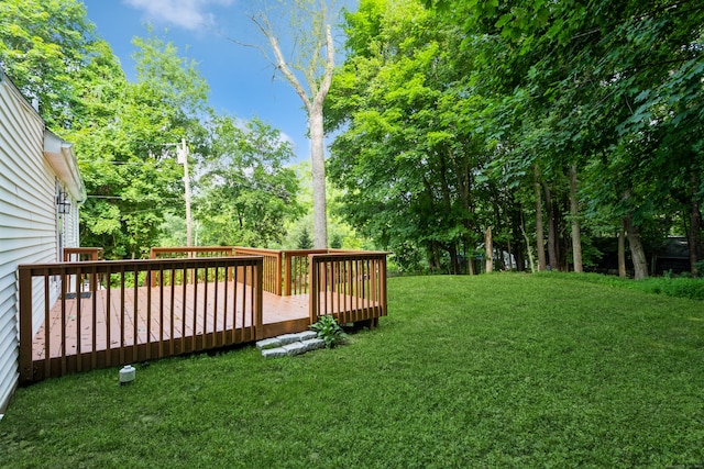 view of yard featuring a wooden deck