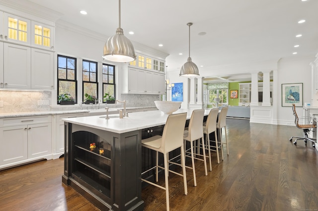 29 Sturges Commons, Westport, CT 06880 - kitchen with open floor plan, ornamental molding, and backsplash