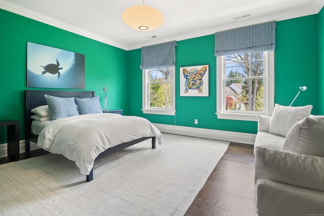 29 Sturges Commons, Westport, CT 06880 - bedroom featuring wood finished floors, visible vents, ornamental molding, and baseboards
