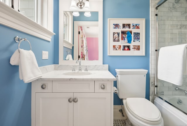 29 Sturges Commons, Westport, CT 06880 - bathroom featuring bath / shower combo with glass door, vanity, and toilet