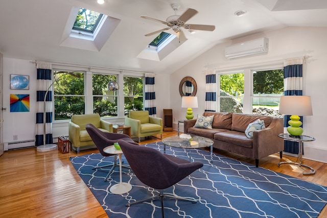 living room featuring plenty of natural light, a wall mounted AC, ceiling fan, and hardwood / wood-style floors