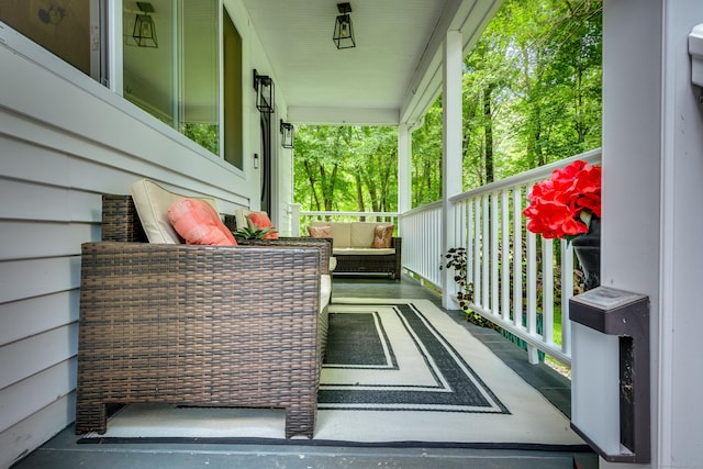 balcony featuring a porch