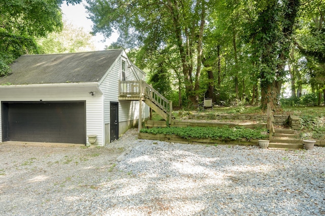 view of side of property featuring a garage