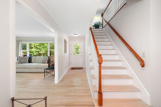 14 Stilson Ln, New Milford, CT 06776 - staircase with wood finished floors, baseboards, and a healthy amount of sunlight