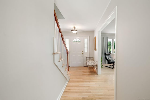 14 Stilson Ln, New Milford, CT 06776 - entryway with baseboards, stairway, and light wood-style floors