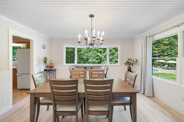 14 Stilson Ln, New Milford, CT 06776 - dining room featuring plenty of natural light, ornamental molding, an inviting chandelier, and a wainscoted wall