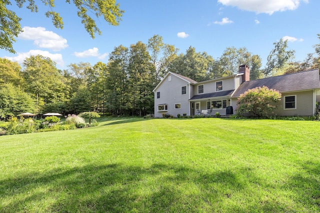 14 Stilson Ln, New Milford, CT 06776 - rear view of property with a yard and a chimney