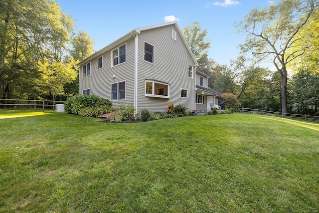 14 Stilson Ln, New Milford, CT 06776 - rear view of property featuring a yard and a fenced backyard