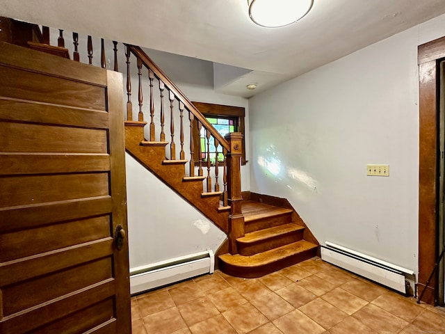 staircase featuring a baseboard radiator