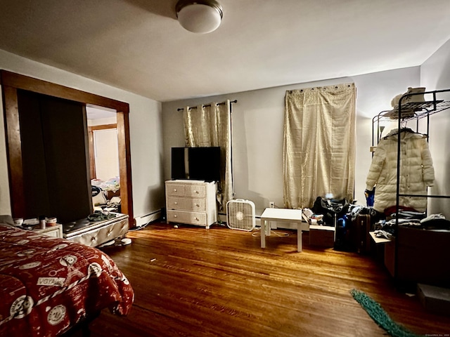 68 Todd St, Hamden, CT 06518 - bedroom featuring a baseboard heating unit and wood finished floors