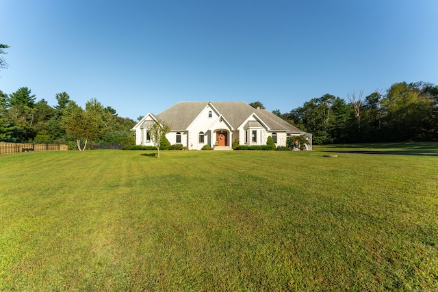 view of front of home with a front lawn