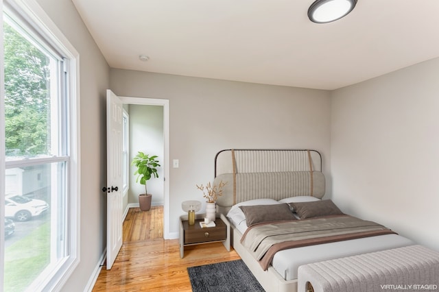 bedroom with light wood-type flooring