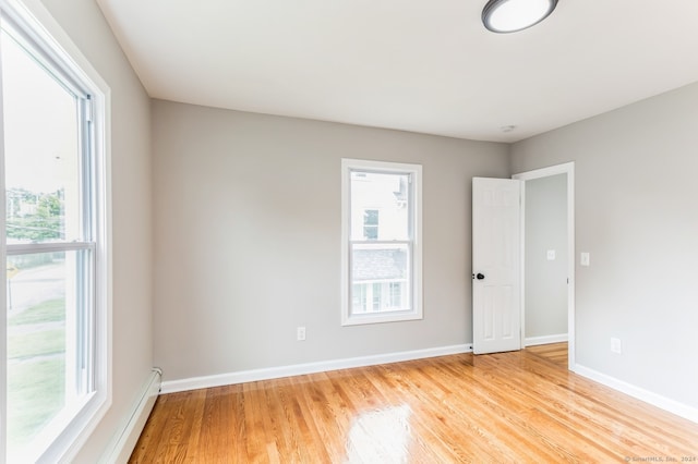 empty room with light wood-type flooring