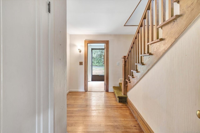 175 Sugar St, Newtown, CT 06470 - foyer entrance featuring stairs, light wood-style flooring, and baseboards