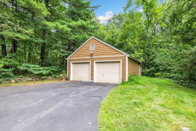 175 Sugar St, Newtown, CT 06470 - detached garage with a forest view