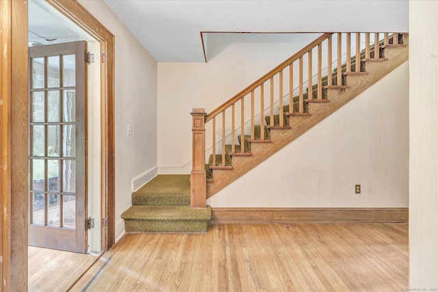 175 Sugar St, Newtown, CT 06470 - stairway with baseboards and wood finished floors