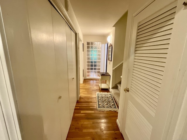 hall with wood-type flooring