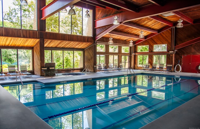 view of pool featuring ceiling fan