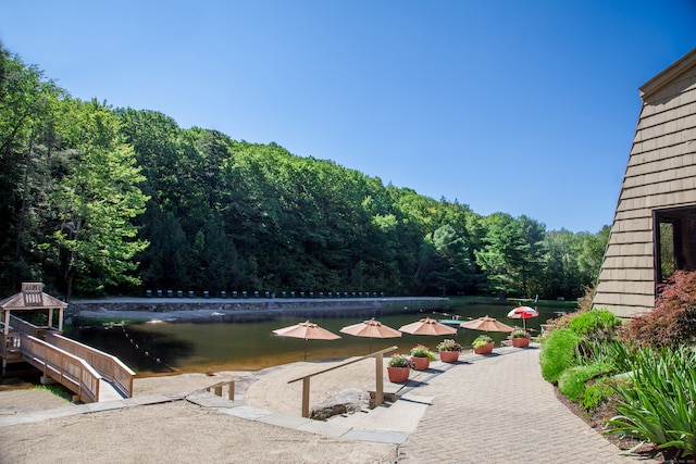 view of patio / terrace with a water view