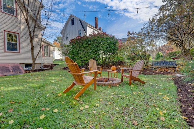 view of yard featuring a fire pit