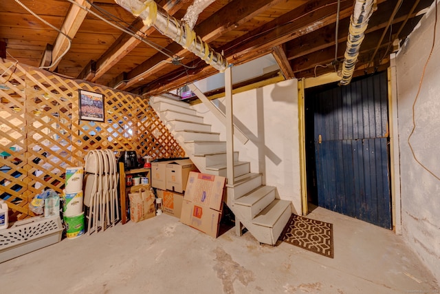 unfinished basement with stairs