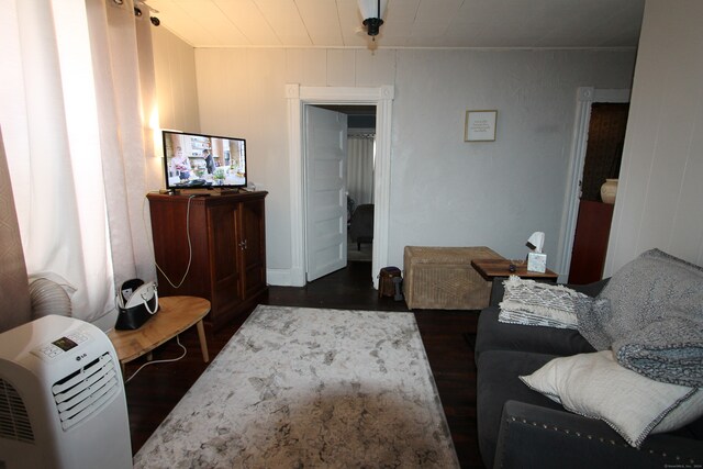 bedroom featuring dark hardwood / wood-style floors