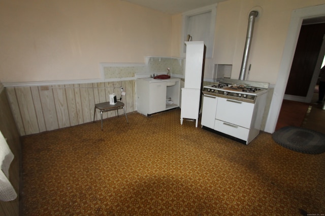 kitchen featuring white gas range