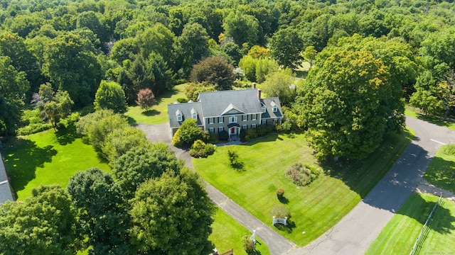 birds eye view of property with a rural view