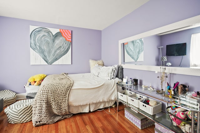 bedroom with wood-type flooring