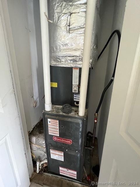 utility room with heating unit